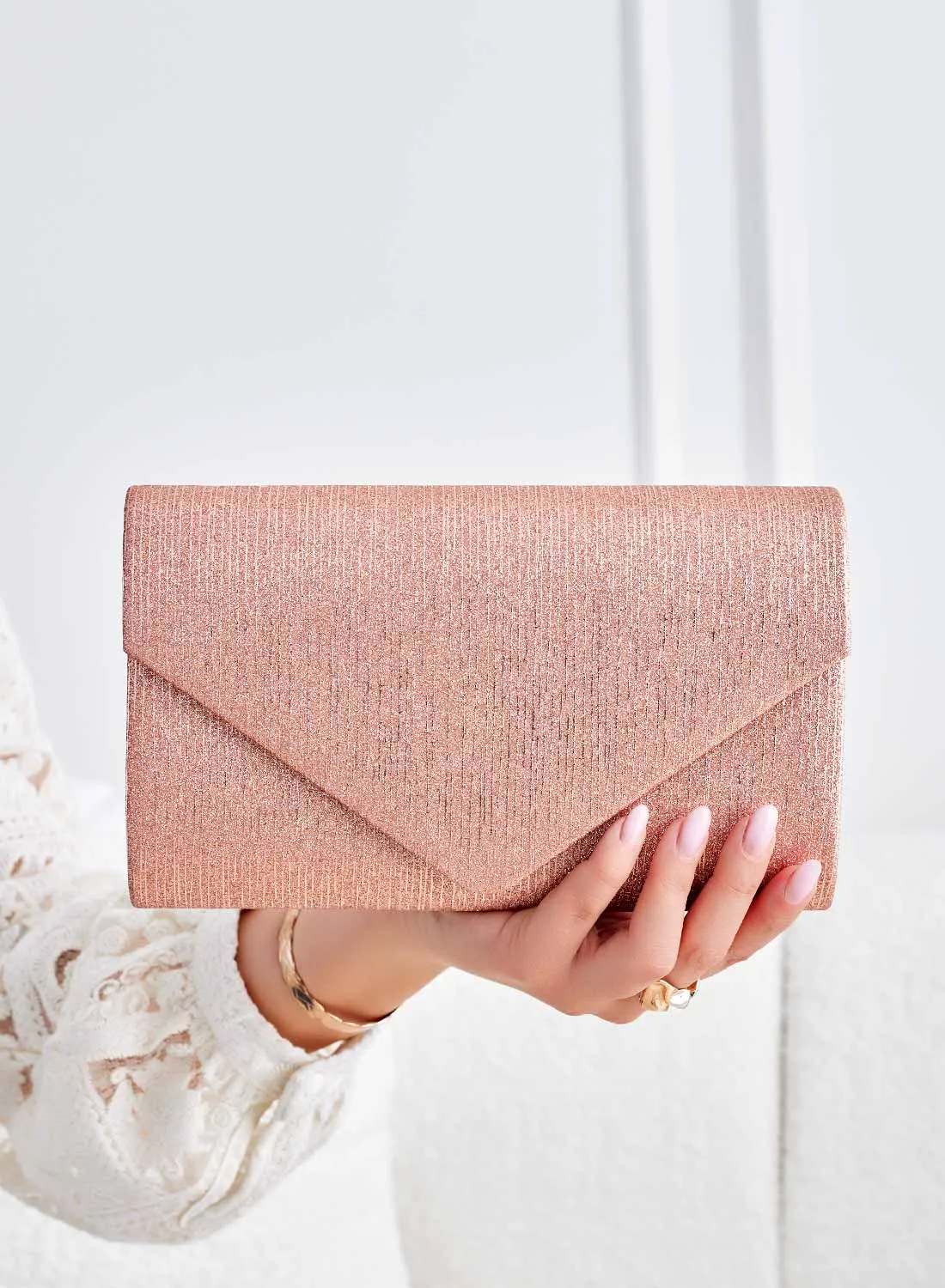 Borsa pochette oro rosa laminata B234