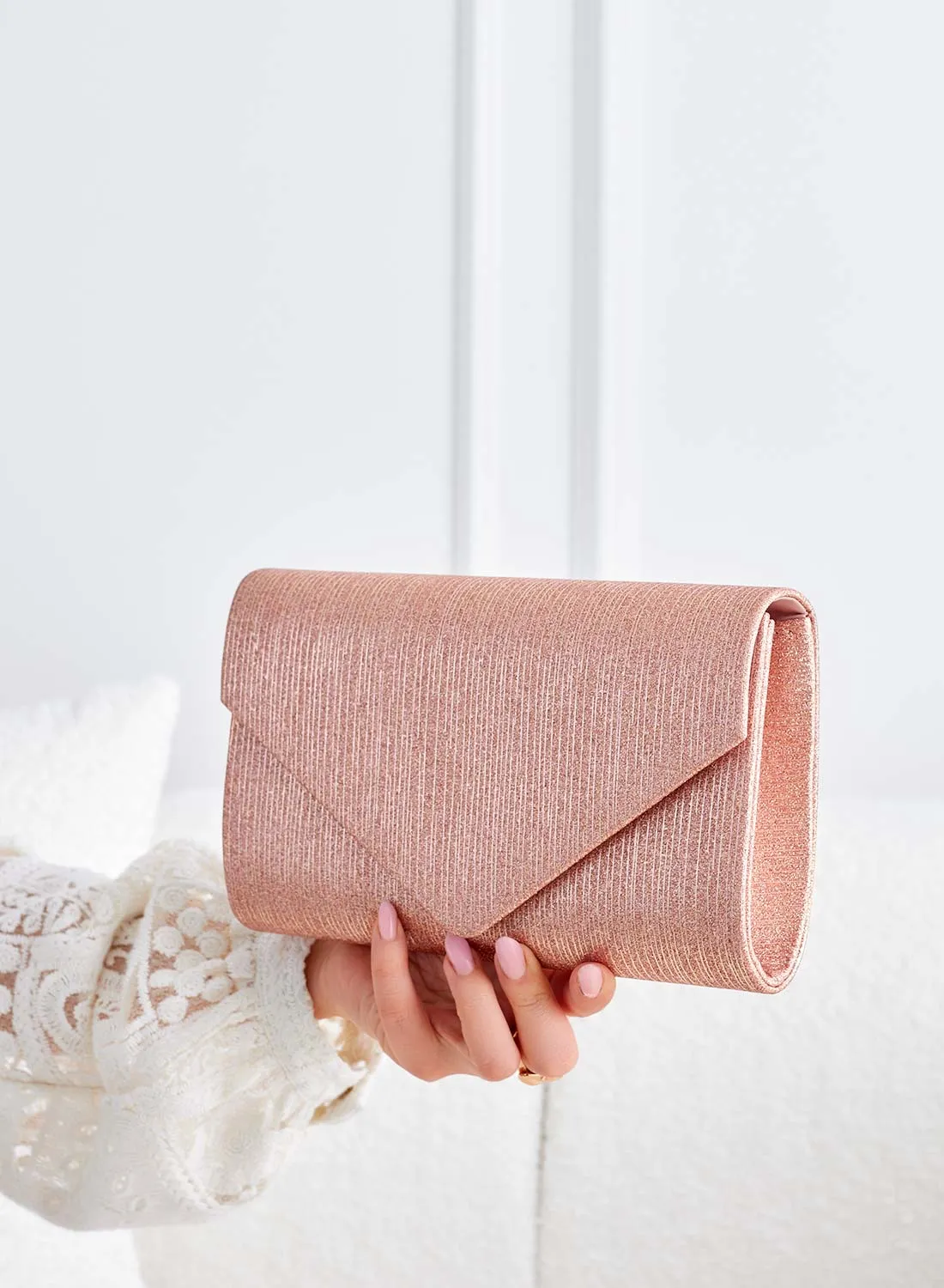 Borsa pochette oro rosa laminata B234