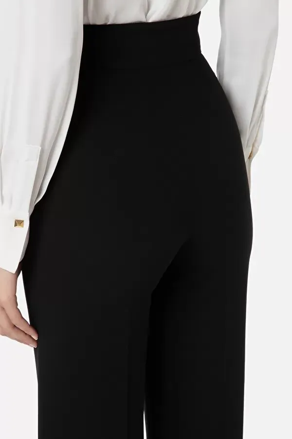 ELISABETTA FRANCHI Pantalone a palazzo con maxi borchie