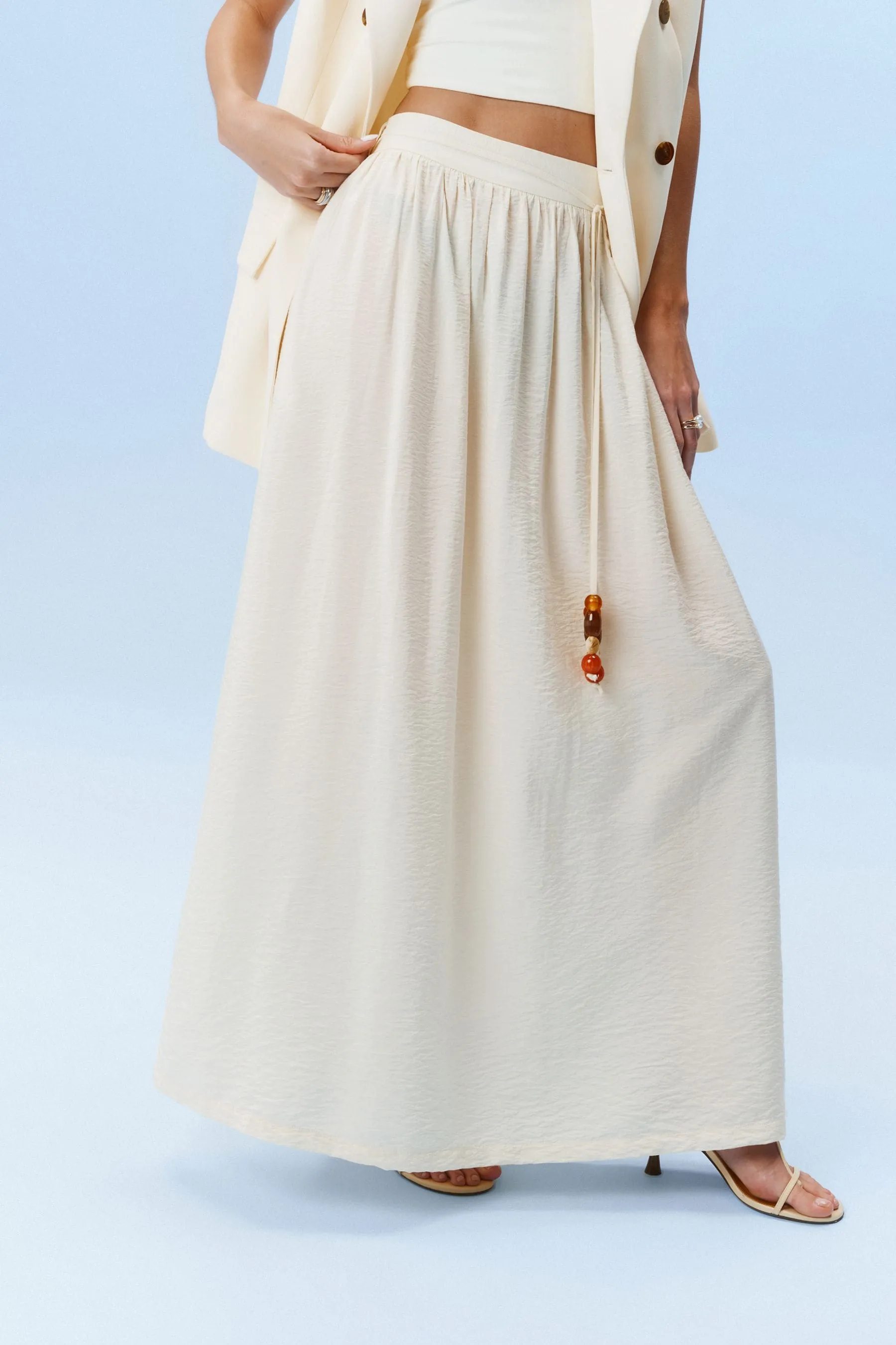 Maxi gonna testurizzata con cintura