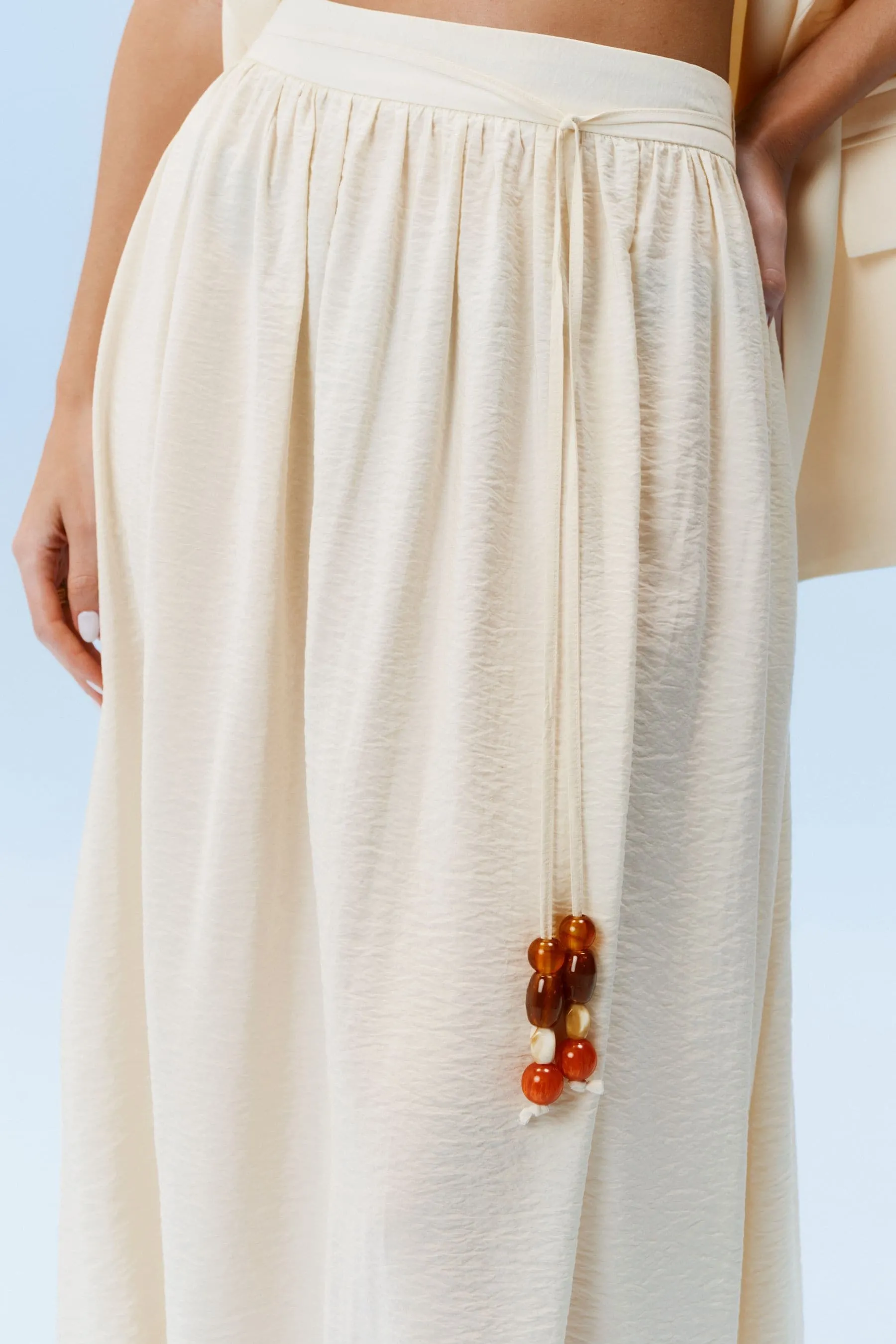 Maxi gonna testurizzata con cintura