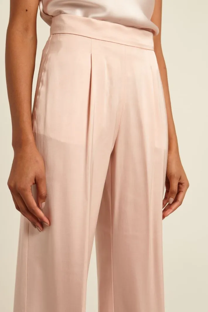 Pantaloni con pinces in raso